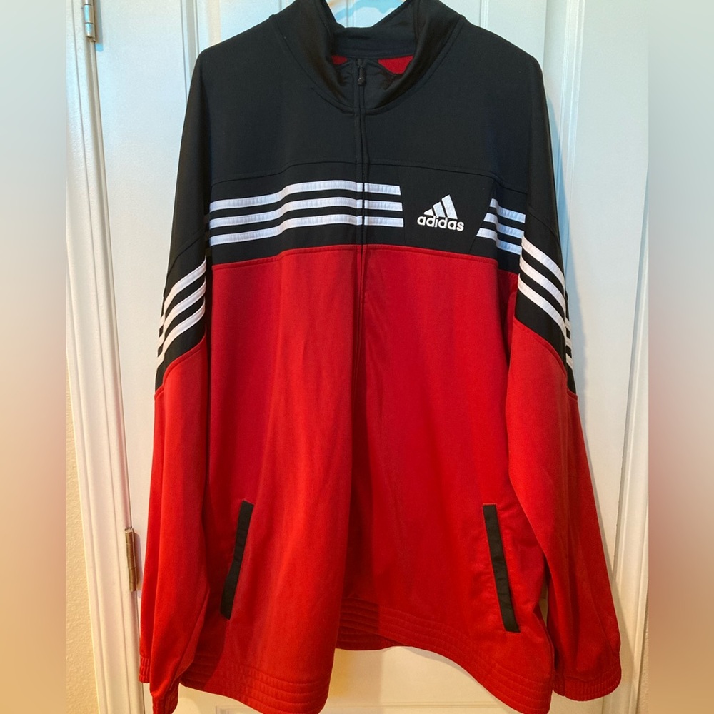 Men’s ADIDAS track suit.